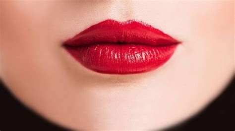 Red lipstick is like a code, a symbol of power carried in women's hands. . Red lip bj